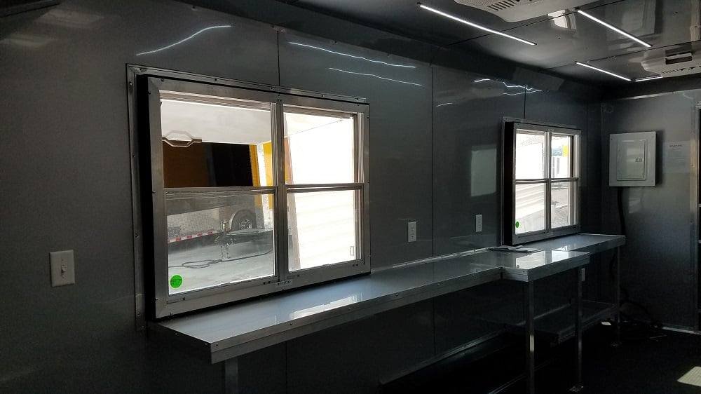 8.5′ x 20′ Penske Yellow Flat Nose Concession Food Trailer — photo 4