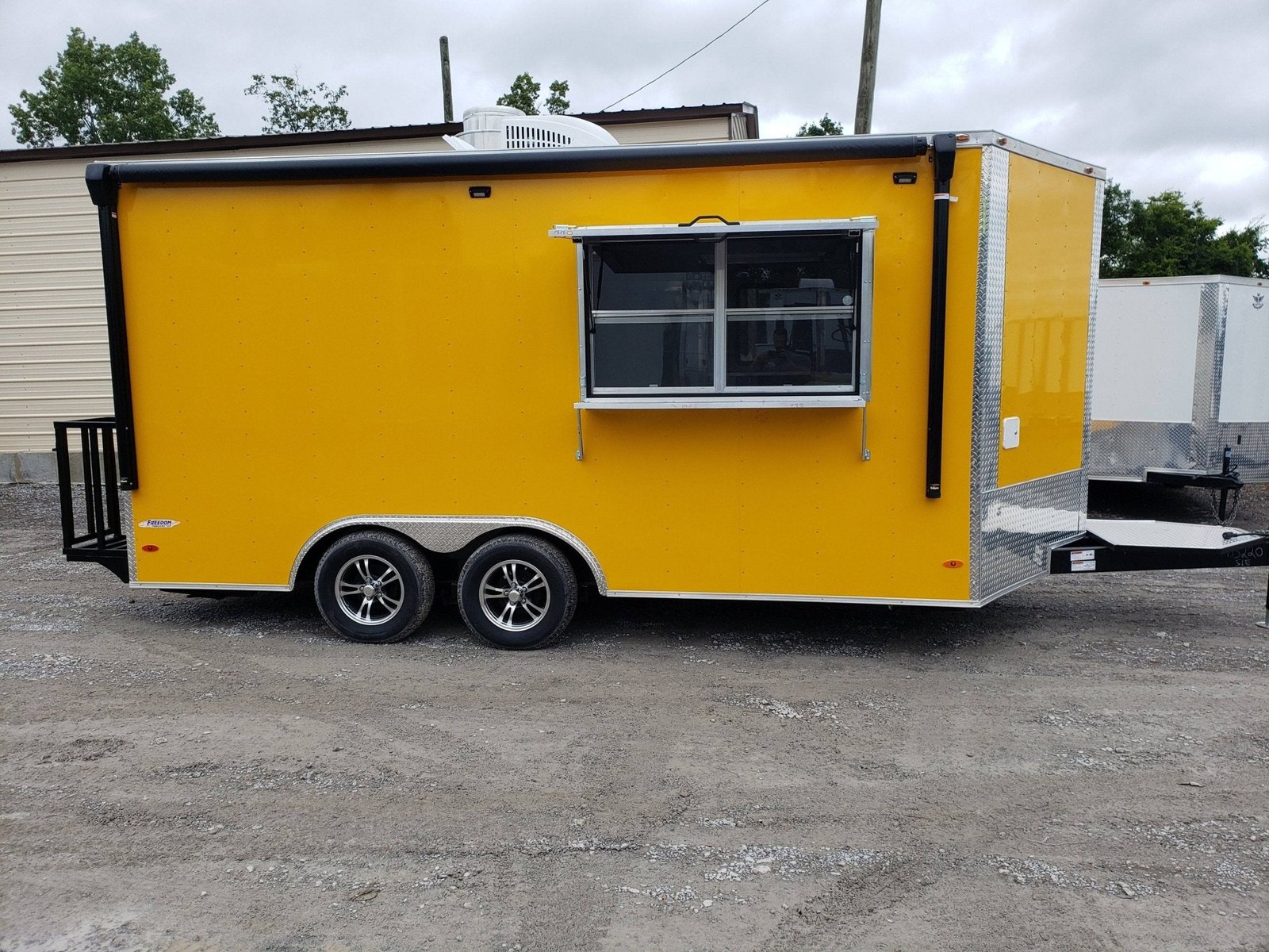 8.5′ x 16′ Penske Yellow Concession Food Trailer — photo 2