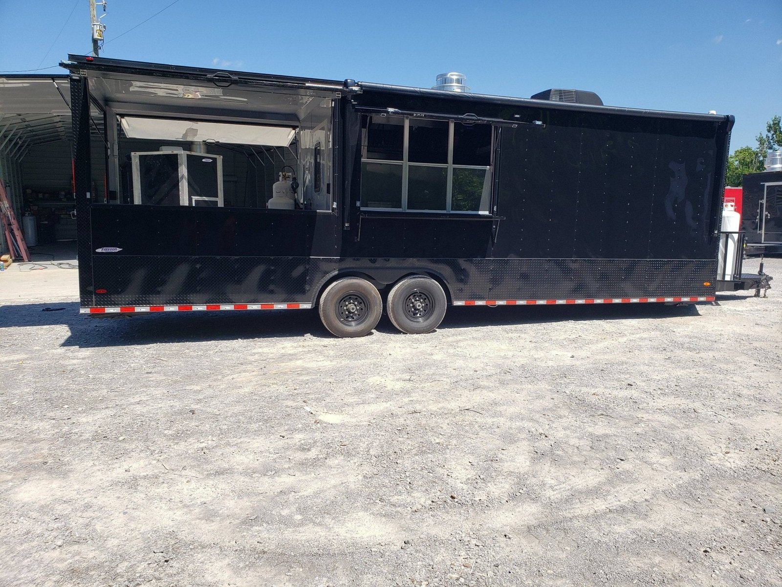 Black Out 8.5′ x 28′ Porch Style Concession Food Trailer — photo 9