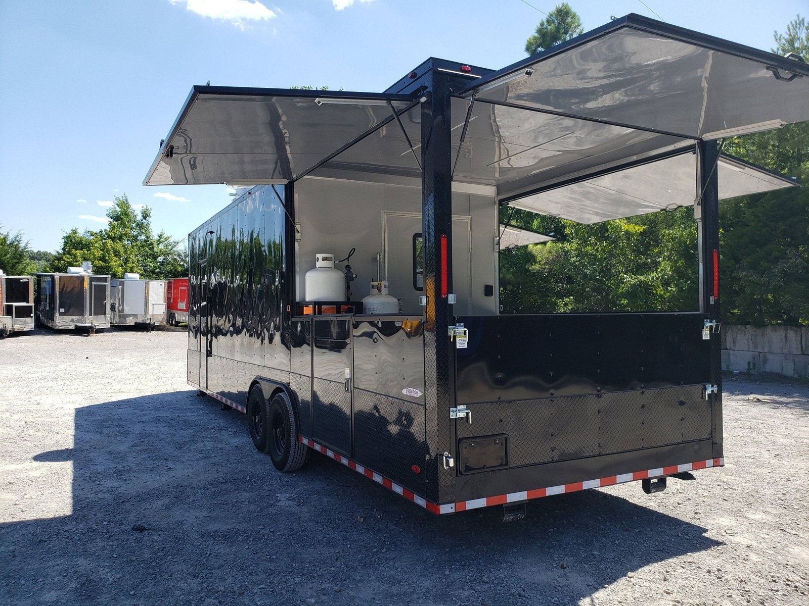 Black Out 8.5′ x 28′ Porch Style Concession Food Trailer — photo 14