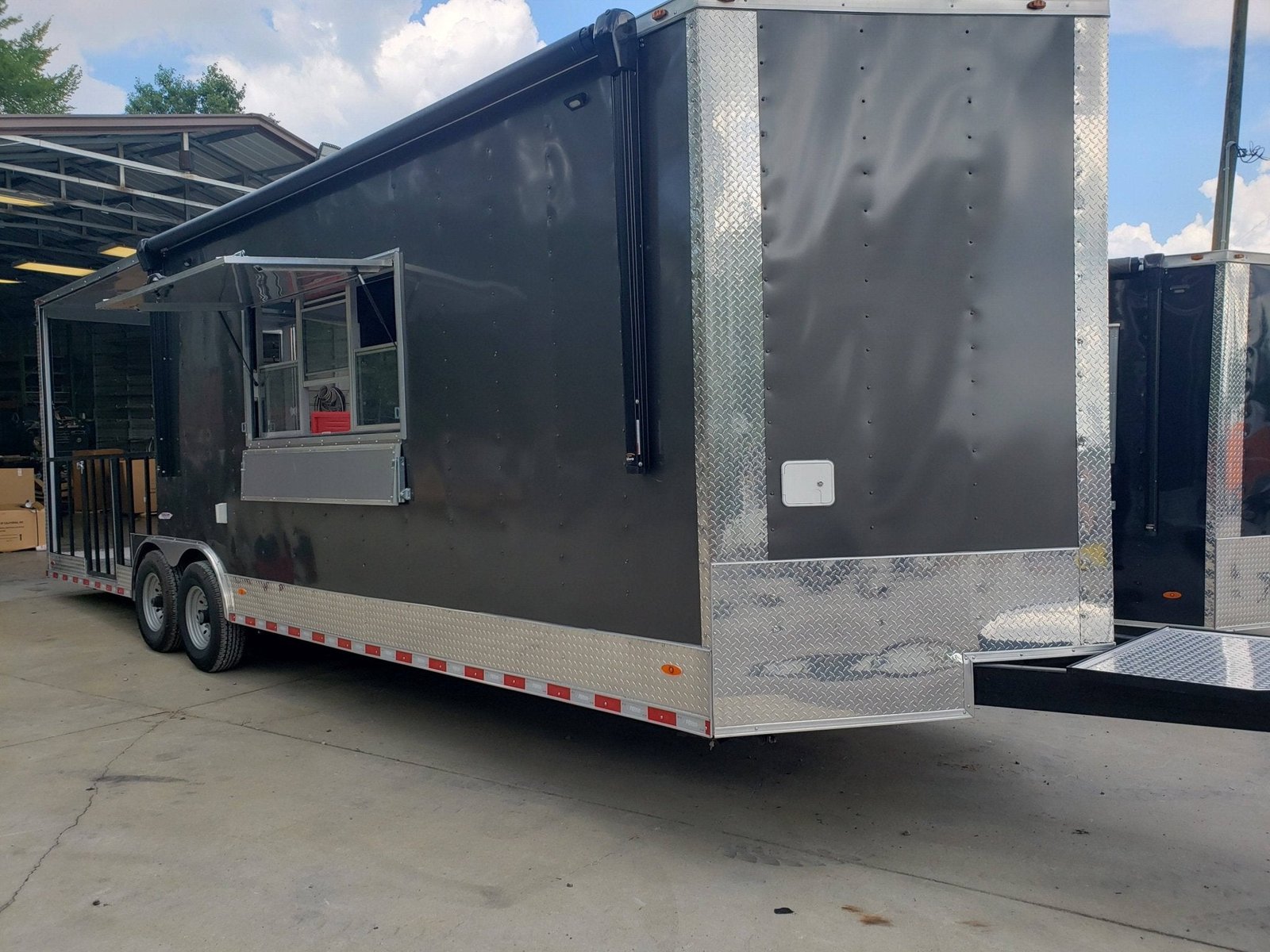 8.5′ x 28′ Charcoal Gray Porch Style Concession Trailer with Restroom