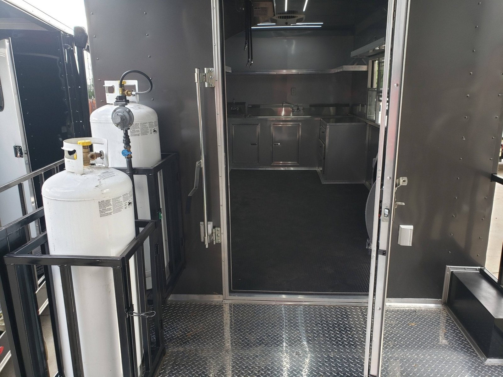 8.5′ x 28′ Charcoal Gray Porch Style Concession Trailer with Restroom — photo 2