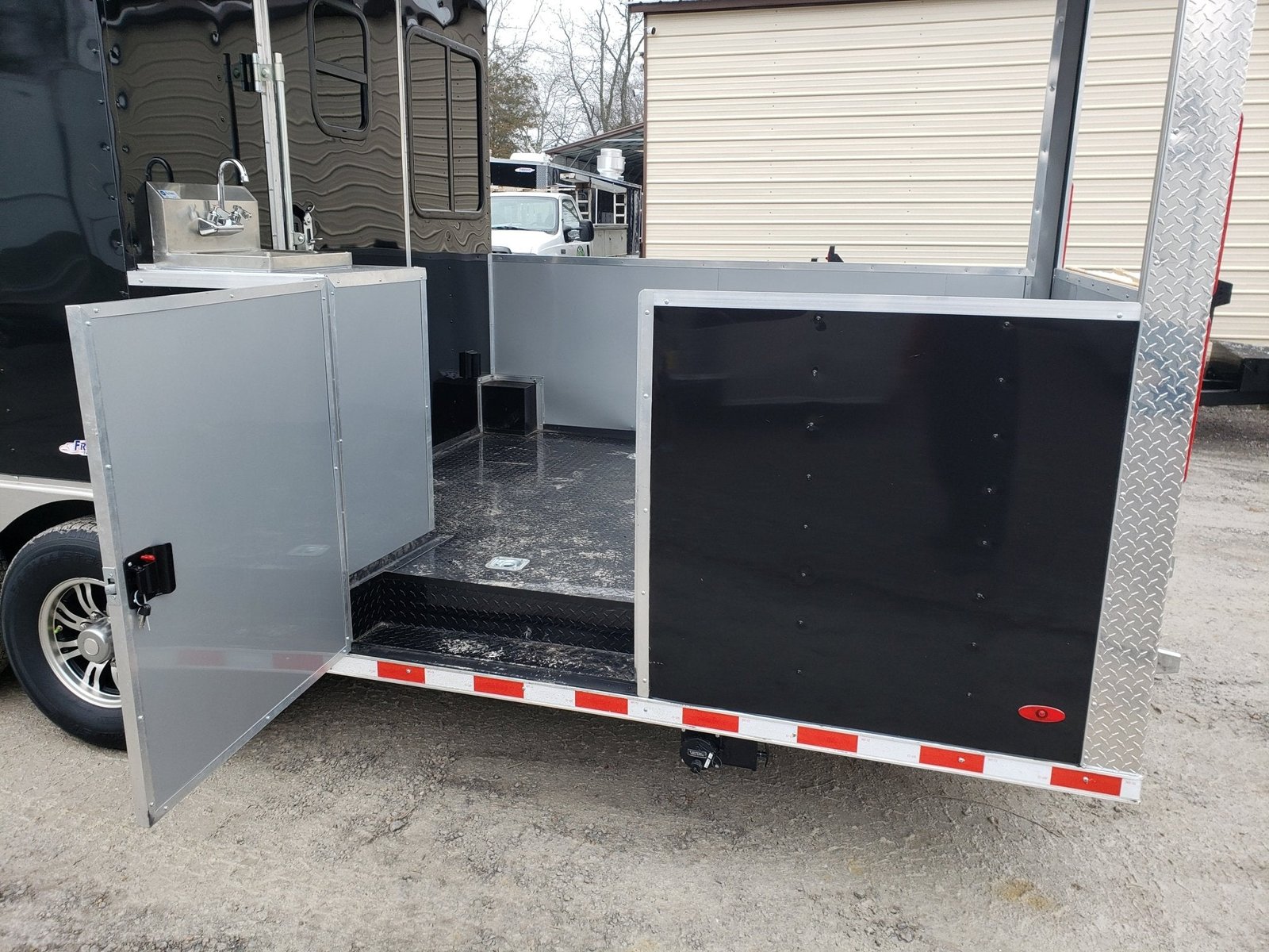 8.5′ x 28′ Black Porch Style BBQ Vending Concession Trailer — photo 12