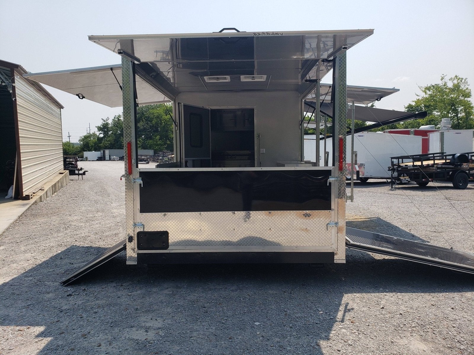 8.5′ x 20′ Black Porch Style Concession Trailer — photo 13