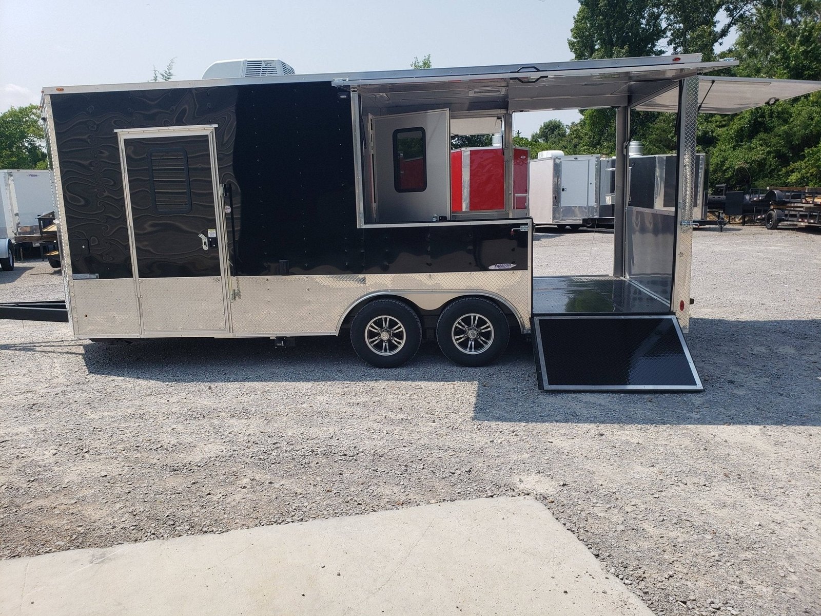 8.5′ x 20′ Black Porch Style Concession Trailer — photo 15