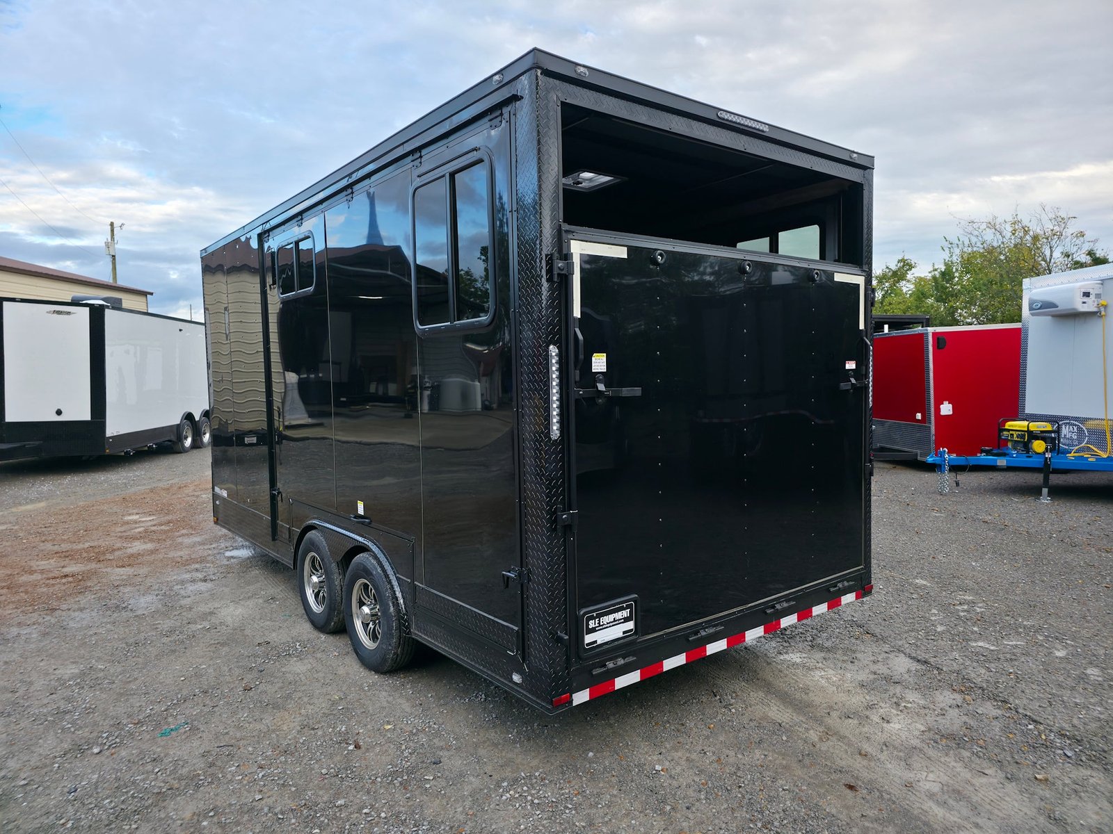 8.5′ X 18′ Black With Blackout Petting Zoo Enclosed Trailer — photo 5