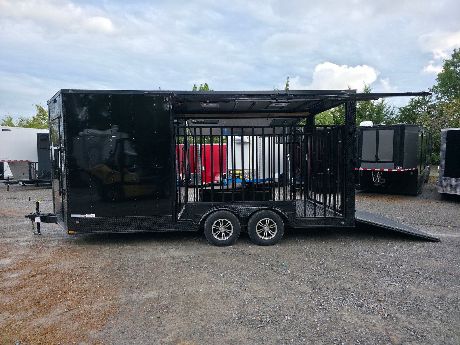 8.5′ X 18′ Black With Blackout Petting Zoo Enclosed Trailer — photo 13