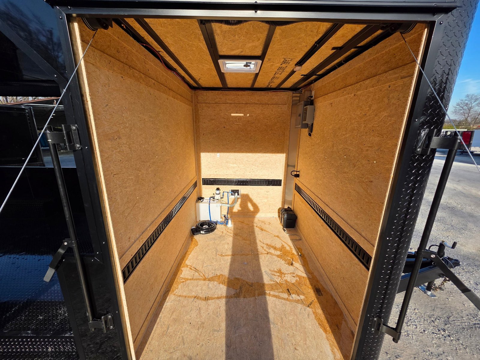 8.5′ X 30′ Custom Black With Blackout Tailgate Trailer — photo 11