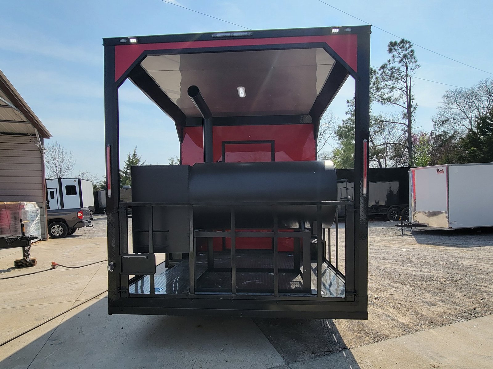 8.5′ X 22′ Custom BBQ Concession Trailer Victory Red With 8′ Porch Black and Blackout Trim — photo 5
