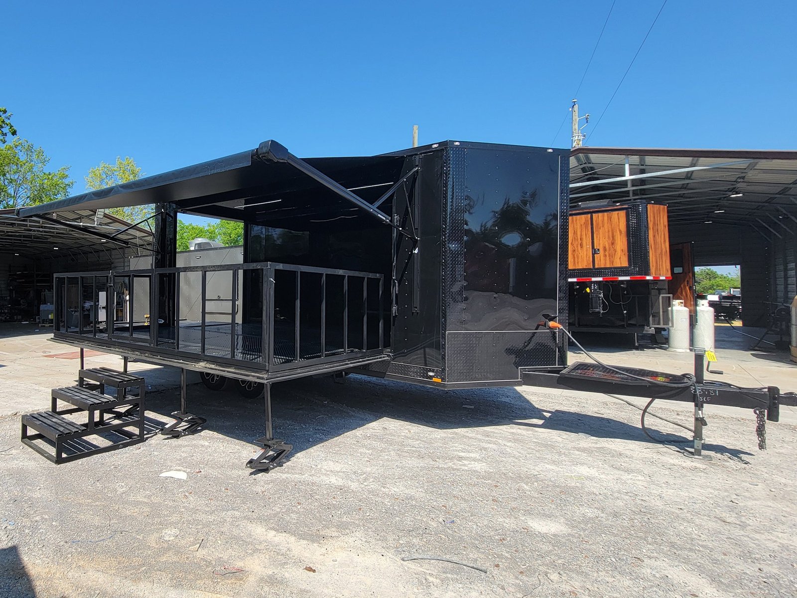 8.5′ X 18′ Custom Enclosed Stage and Event Deck over Blackout With Black Trim — photo 3