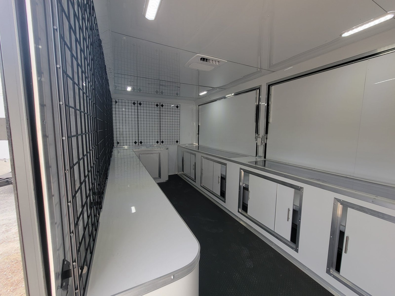 8.5′ X 18′ Black With Blackout Marketing and Vending Event Trailer With Grid Wall — photo 11