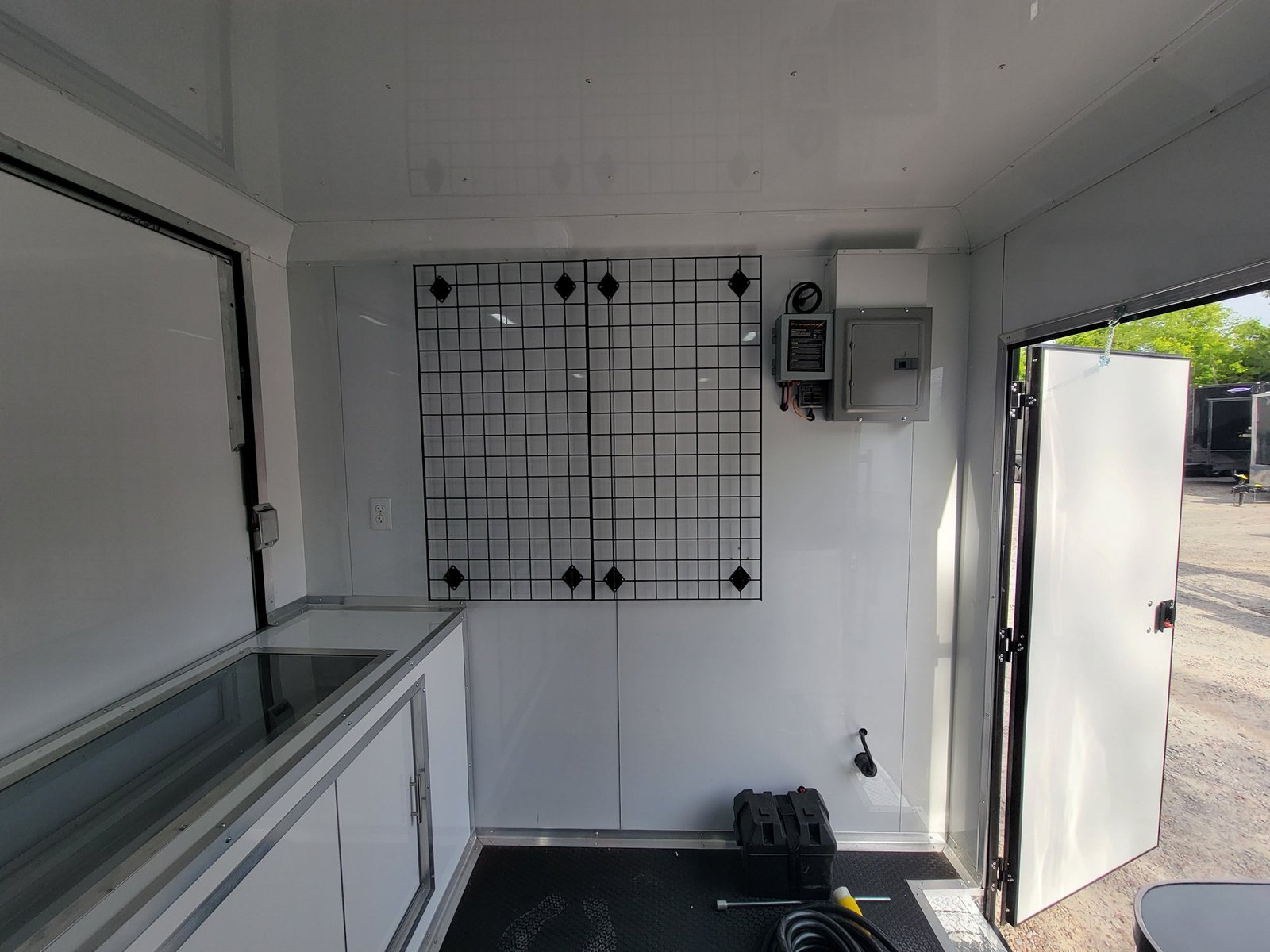 8.5′ X 18′ Black With Blackout Marketing and Vending Event Trailer With Grid Wall — photo 15