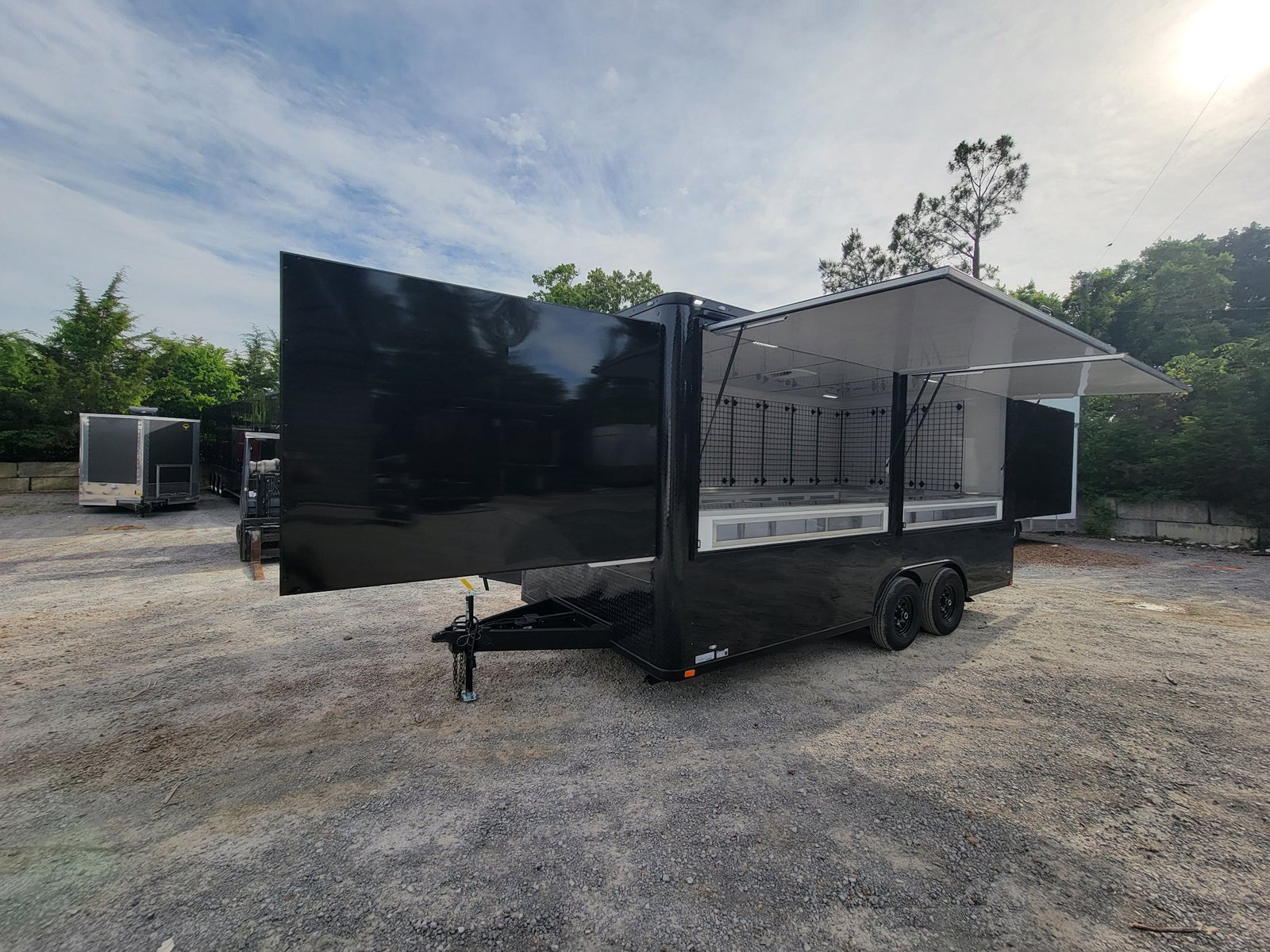 8.5′ X 18′ Black With Blackout Marketing and Vending Event Trailer With Grid Wall