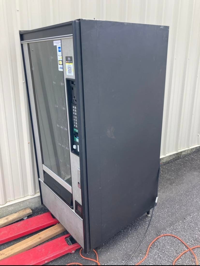 499922050_122131537676769983_250721166010087001_n.jpg Used Crane National 148 snack machine, Silver Star glass-front vendor - view 2