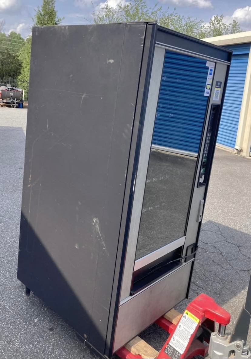 499925826_122131537682769983_3556096009213601090_n.jpg Used Crane National 148 snack machine, Silver Star glass-front vendor - view 3