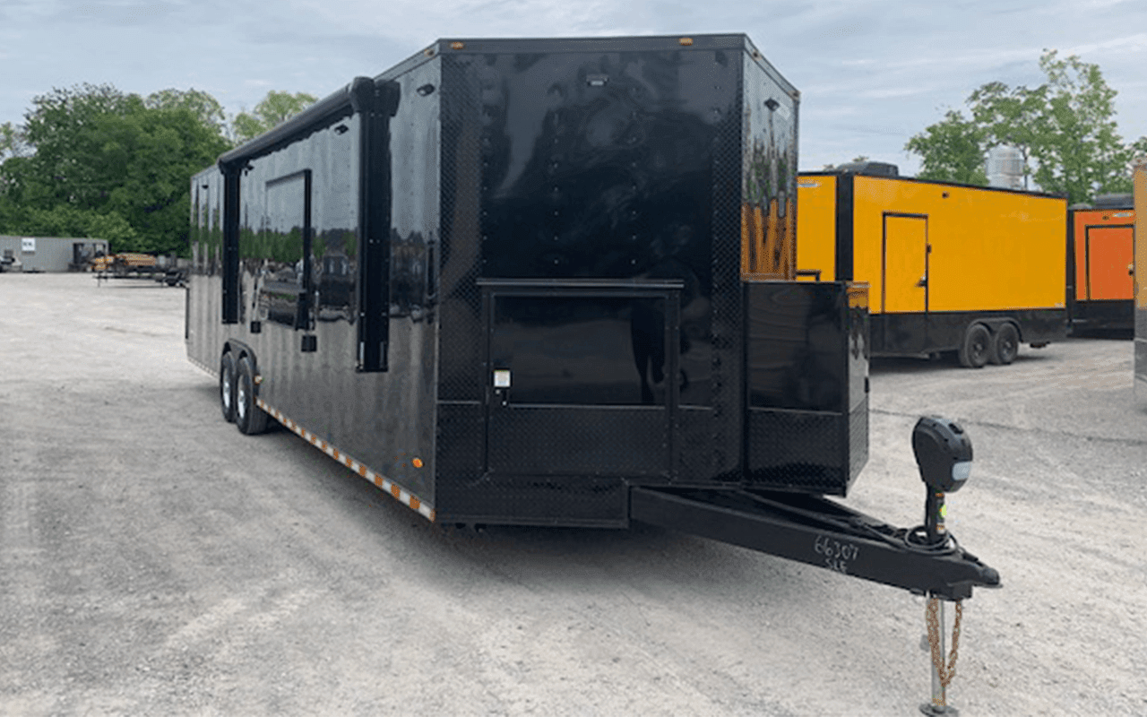 8.5′ x 30′ Black Concession Food Trailer With Appliances