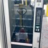 Used Crane National 148 snack machine, Silver Star glass-front vendor