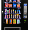 Used Seaga INF4S infinity snack machine, four-wide ambient glass-front vendor
