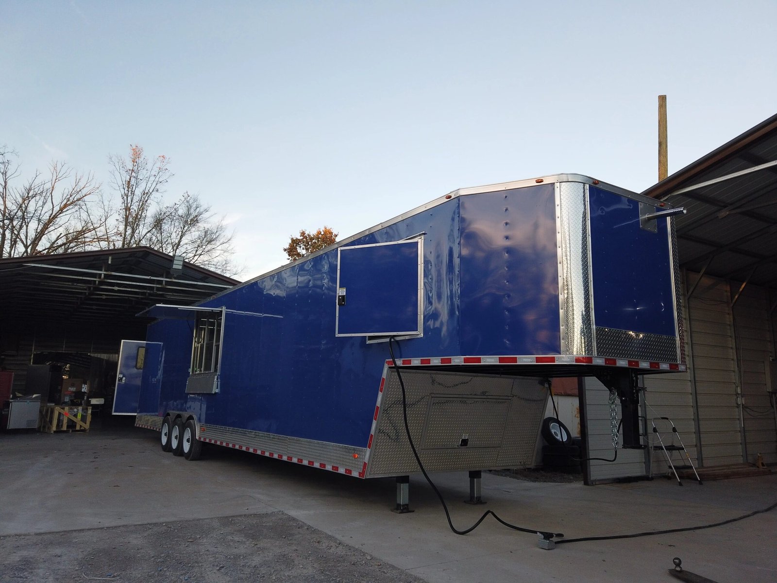 8.5′ x 46′ Cobalt Blue Gooseneck Concession Trailer (Without Appliances)