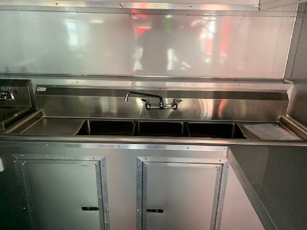 8.5′ x 24′ Orange Concession Food Trailer with Restroom and Appliances — photo 6