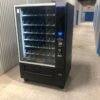 Used Crane Merchant Media 187 snack vending machine with touchscreen