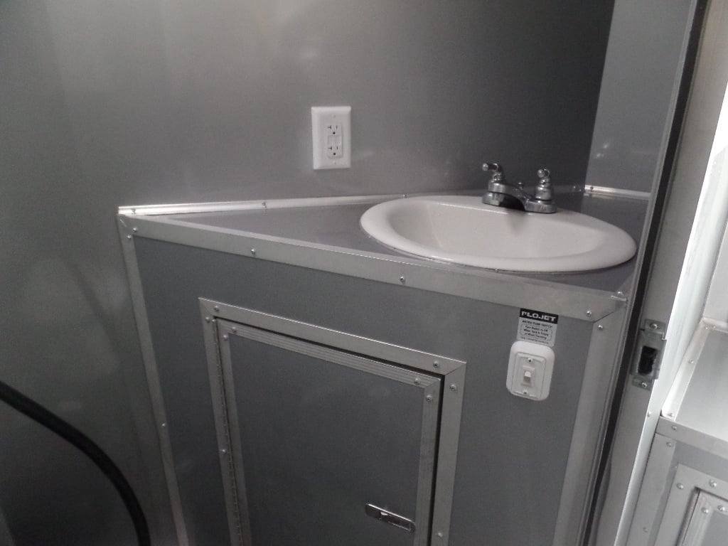 8.5′ x 30′ Black and Orange Porch Style Concession Trailer with Restroom and Appliances — photo 10