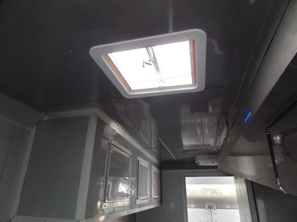 8.5′ x 30′ Black and Orange Porch Style Concession Trailer with Restroom and Appliances — photo 6